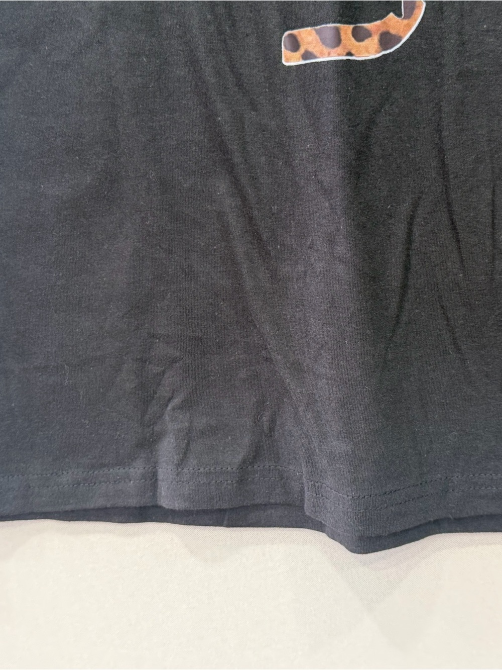 Calvin Klein Black Short-Sleeve Tee with Leopard Logo - Picture 6 of 6